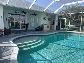 1042 Boundary Blvd in Rotonda West, FL - Building Photo - Building Photo