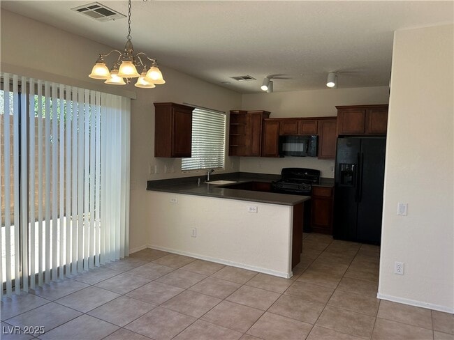 9029 Castledowns St in Las Vegas, NV - Building Photo - Building Photo