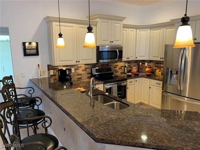 property at 8906 Lely Island Cir