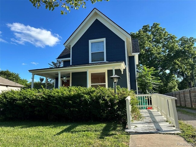 property at 715 E Grand River Ave