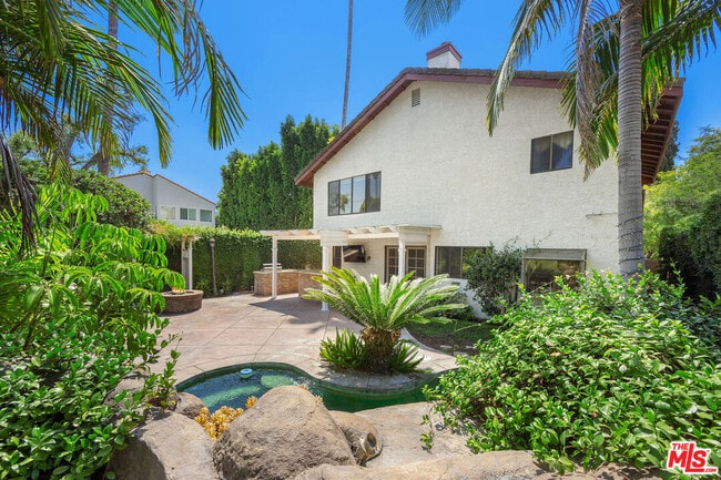 property at 13031 Magnolia Blvd