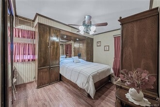 6 Fernwood Terrace N in Stewart Manor, NY - Building Photo - Building Photo