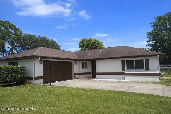 property at 6485 Manila Dr