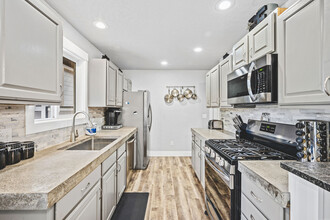 11168 N Bartlett Ave in Hayden, ID - Foto de edificio - Building Photo