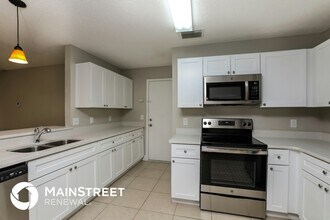 10729 Satinwood Cir in Orlando, FL - Foto de edificio - Building Photo