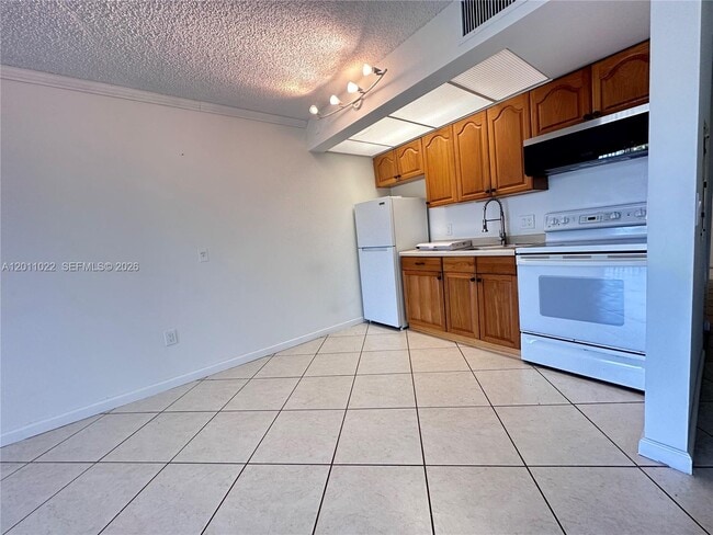 property at 13455 SW 16th Ct
