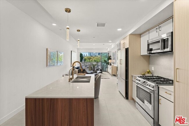 property at 1257 N Sweetzer Ave