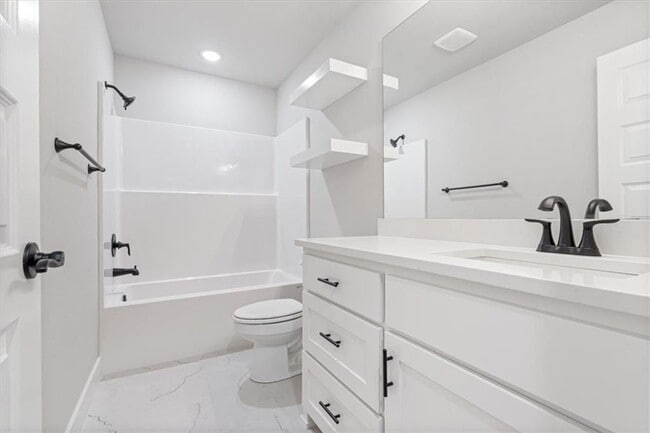 property at 7002 SW Basswood Ave