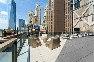 113 Nassau St in New York, NY - Building Photo - Building Photo