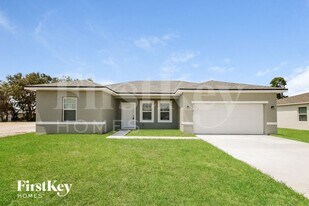 318 W Aster Ct in Poinciana, FL - Building Photo