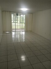 1401 NE 191st St, Unit D111 in Miami, FL - Building Photo - Building Photo