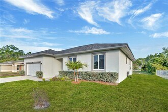 719 Little Rock St E in Lehigh Acres, FL - Building Photo - Building Photo