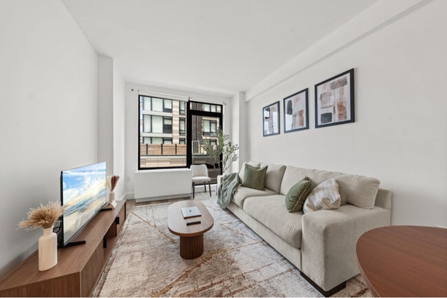property at 228 E 135th St