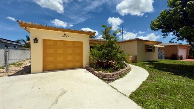 property at 6957 NW 9th Ct