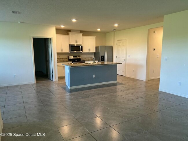1371 McFarland Dr in West Melbourne, FL - Building Photo - Building Photo