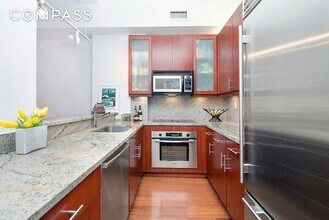 80 John St, Unit 11E in New York, NY - Building Photo - Building Photo