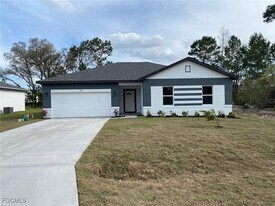 540 Genoa Ave S in Lehigh Acres, FL - Building Photo