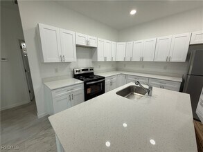 106 Moore Ave in Lehigh Acres, FL - Building Photo - Building Photo