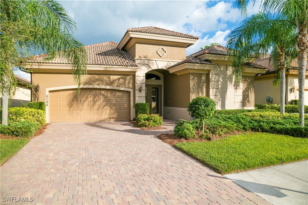 6088 Dogleg Dr in Naples, FL - Foto de edificio