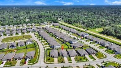 24063 Hawthorn Lks Dr in Roman Forest, TX - Building Photo - Building Photo