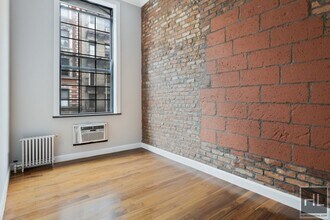 E 11th St in New York, NY - Building Photo - Building Photo