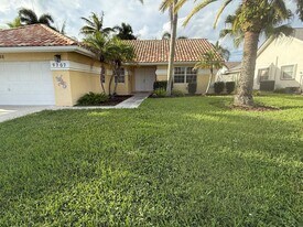9707 Sun Pointe Dr in Boynton Beach, FL - Building Photo