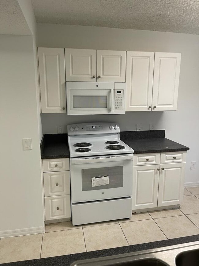 property at 9640 NW 2nd St