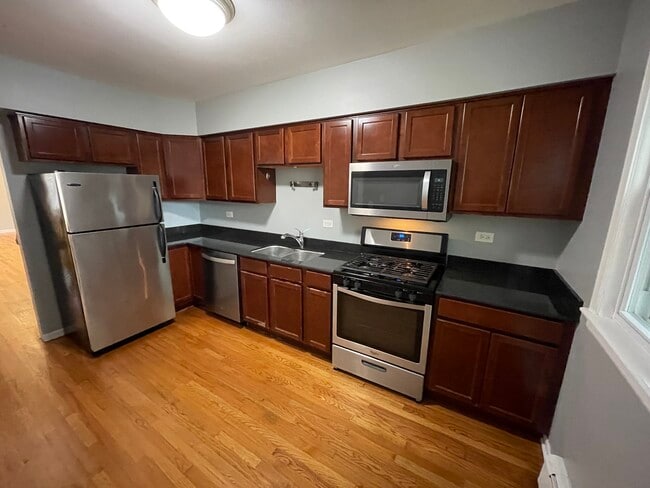 1817 W Touhy Ave, Unit 4 in Chicago, IL - Foto de edificio - Building Photo