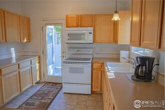 1371 Saginaw Pointe Dr in Windsor, CO - Building Photo - Building Photo