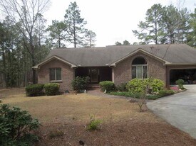 1236 Rays Bridge Rd in Whispering Pines, NC - Building Photo