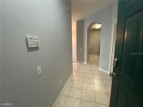 7123 Yacht Basin Ave-Unit -Apt 310 in Orlando, FL - Building Photo - Building Photo