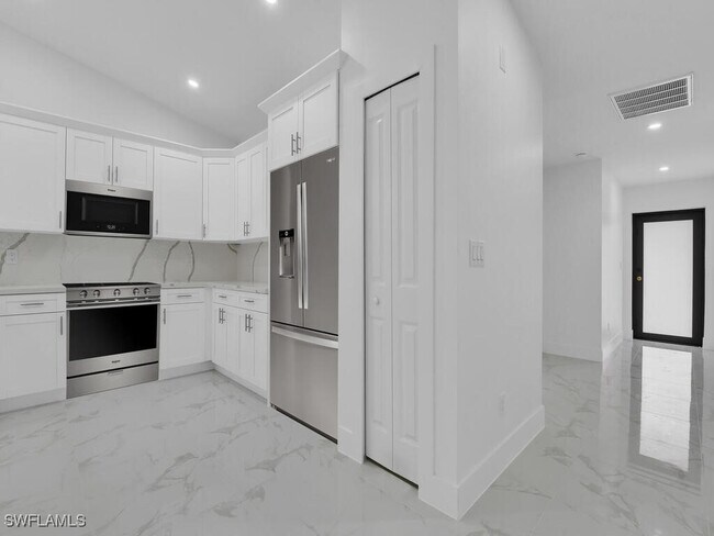 property at 4929-4931 Leonard Blvd S