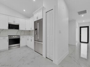 4929-4931 Leonard Blvd S in Lehigh Acres, FL - Building Photo - Building Photo