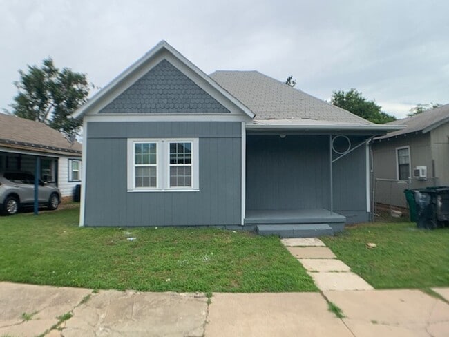 property at 115 SW 23rd St