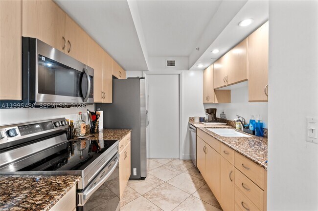 property at 6917 Collins Ave