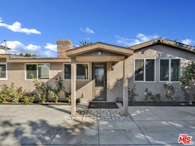 property at 6842 Ranchito Ave