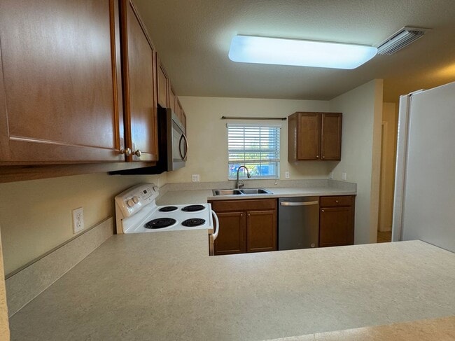 9093 Gervais Cir, Unit 1906- in Naples, FL - Foto de edificio - Building Photo