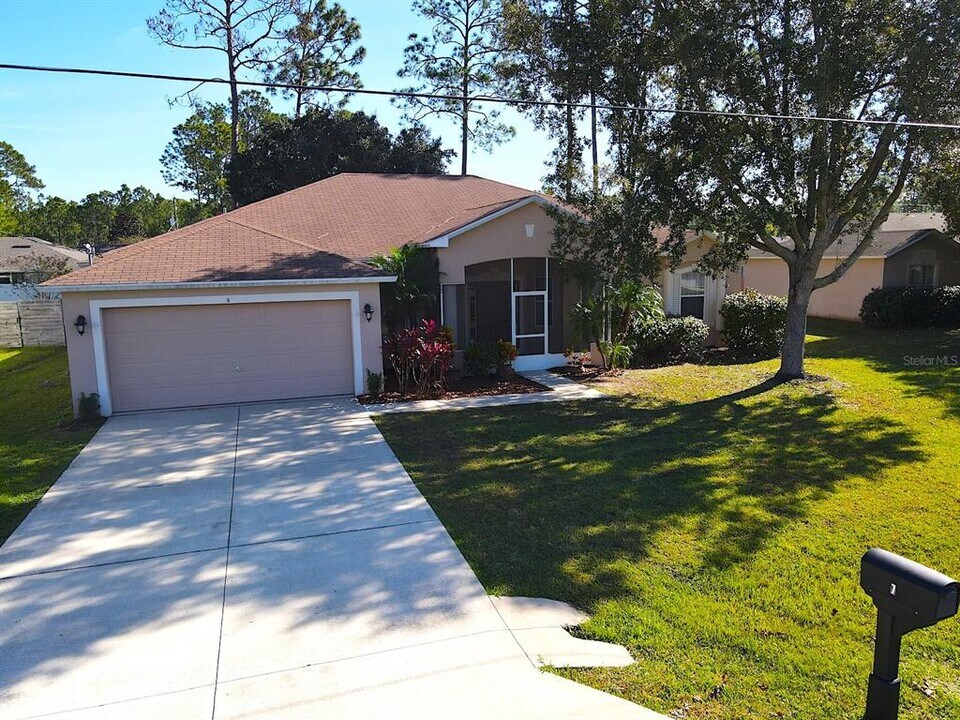 7 Zither Ct in Palm Coast, FL - Building Photo