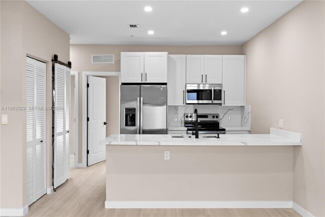 property at 630 NE 166th St