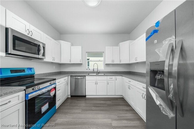 1103 Gigon Ct in Sebring, FL - Building Photo - Building Photo