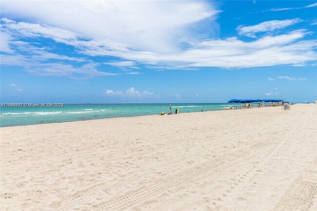 property at 8877 Collins Ave