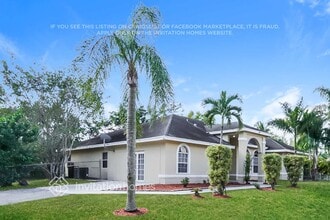 13634 78th Pl N in West Palm Beach, FL - Foto de edificio - Building Photo