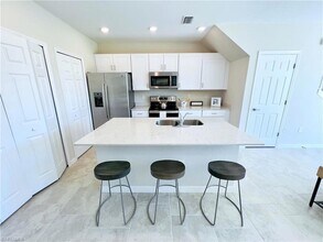 14297 Oviedo Pl in Tice, FL - Building Photo - Building Photo