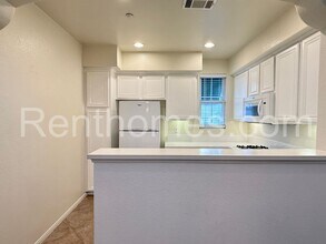 6473 Terraza Portico in Carlsbad, CA - Building Photo - Building Photo