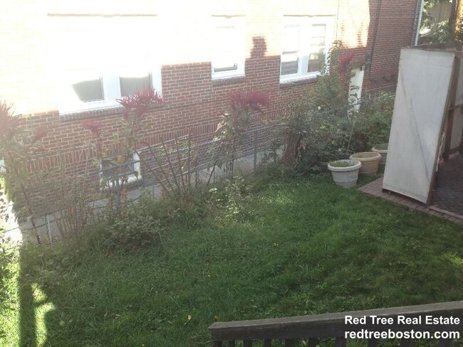289 Foster St, Unit 1 in Boston, MA - Building Photo - Building Photo