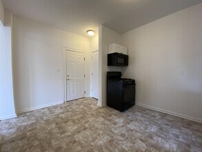 84 W 25th St-Unit -A1 in Bayonne, NJ - Building Photo - Building Photo