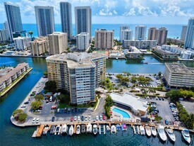 100 Golden Isles Dr, Unit 1410 in Hallandale Beach, FL - Building Photo