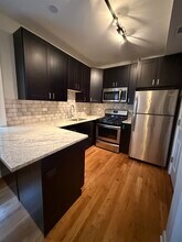 2211 W Eastwood Ave, Unit 2201-2E in Chicago, IL - Building Photo - Building Photo