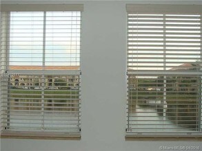 10805 NW 89th Terrace-Unit -2034 in Doral, FL - Building Photo - Building Photo