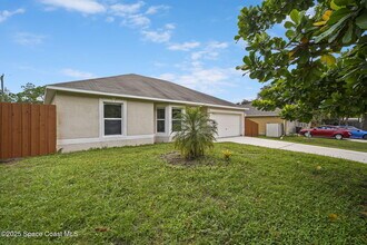 411 Oceanside St in Palm Bay, FL - Building Photo - Building Photo